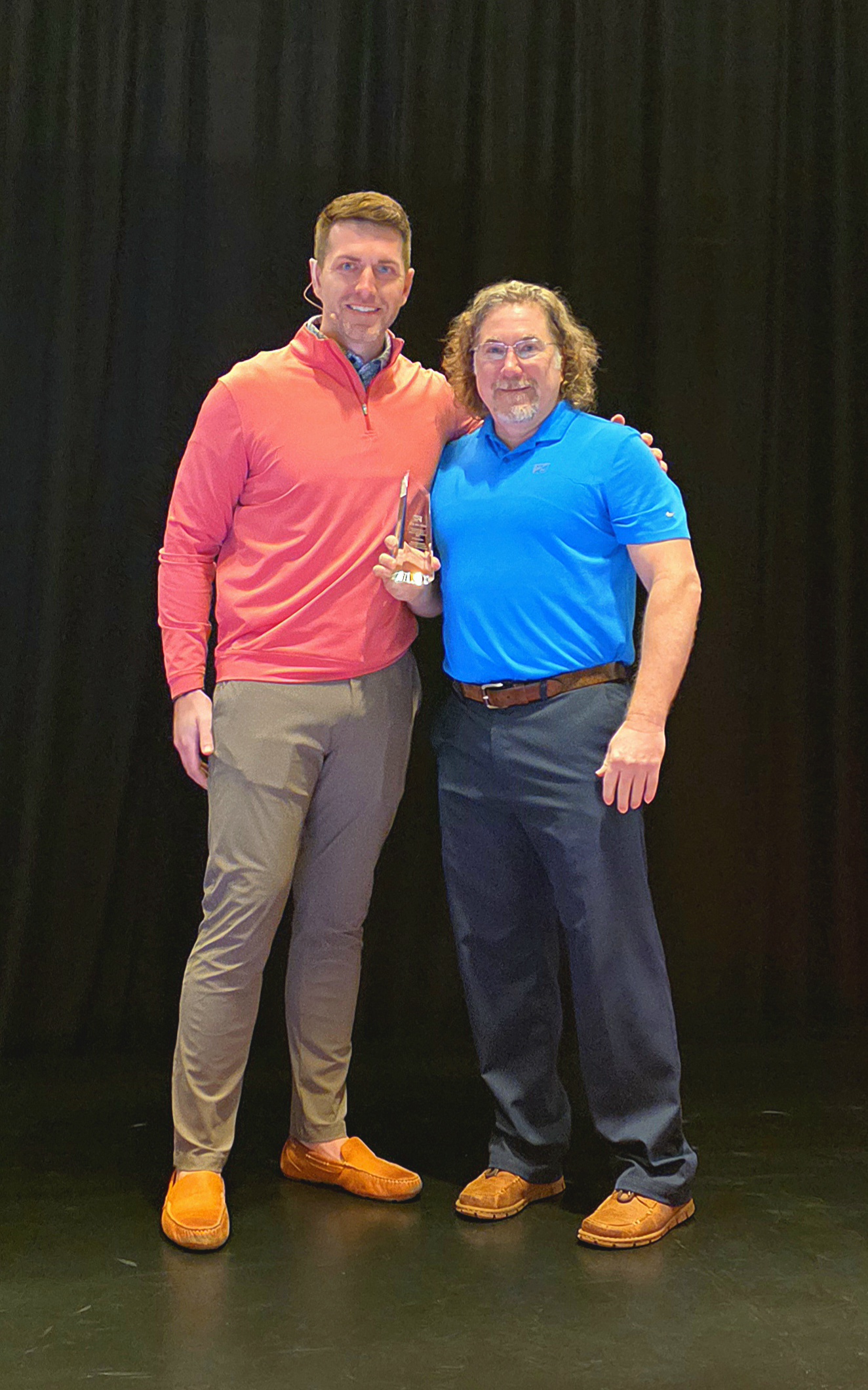 Ryan receiving award